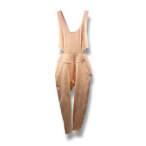 Free People Movement NWOT Back It Up Cutout Crisscross Back Jumpsuit in Peach Si